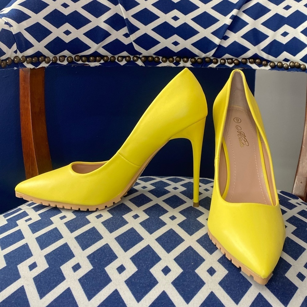 Canary yellow pointed toe high heel stiletto lug pumps